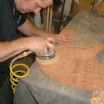 Flamed redwood top being fitted to Korina body